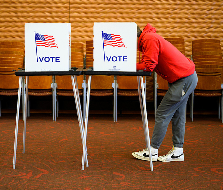 Students complete their confidential ballots